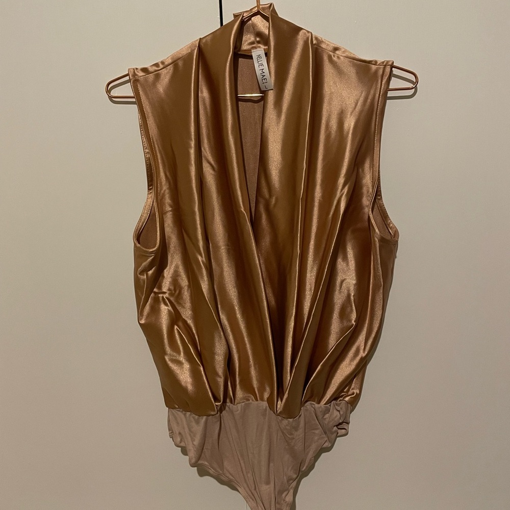 |Sleeveless mocha body suit, never been worn|